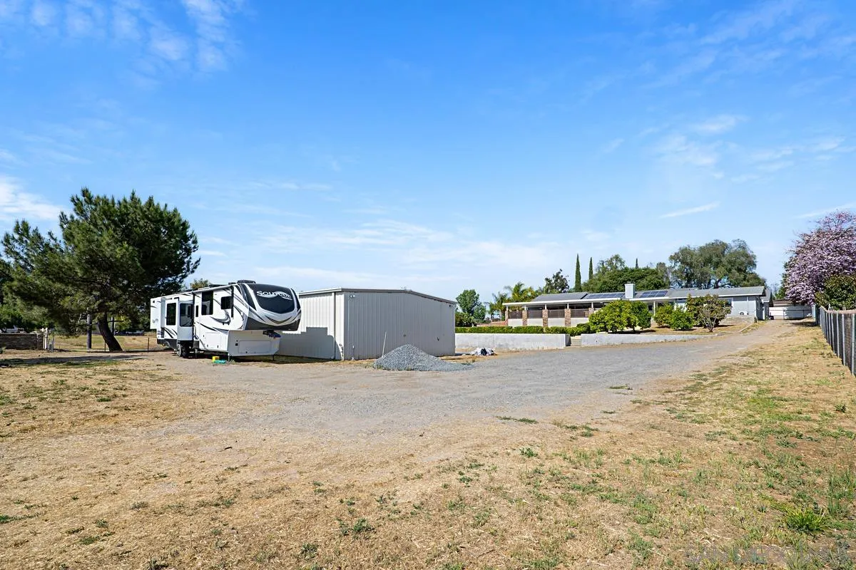 821 Steffy Road Ramona, CA 92065 - Photo 14 of 35 a view of a road with a building in the background