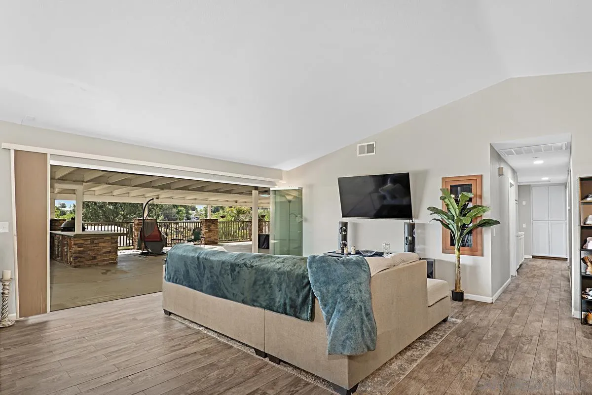 821 Steffy Road Ramona, CA 92065 - Photo 7 of 35 a living room with furniture and a flat screen tv