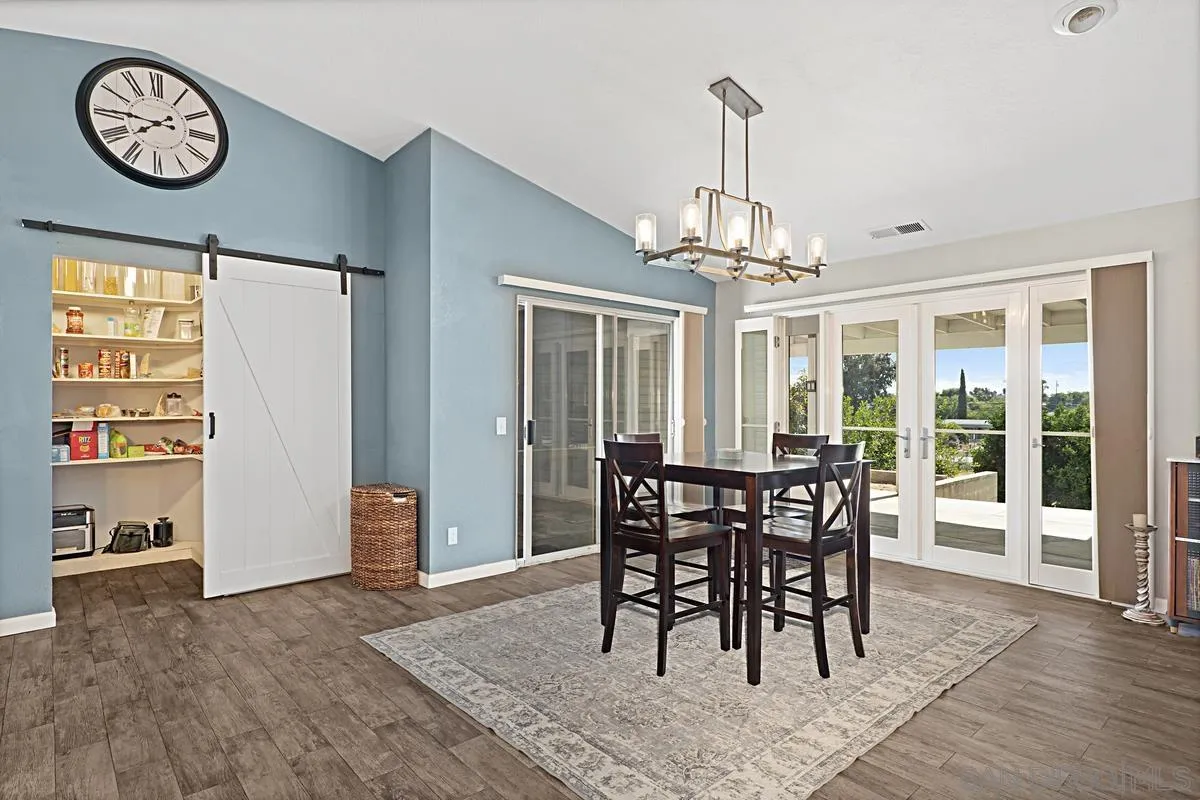 821 Steffy Road Ramona, CA 92065 - Photo 8 of 35 a view of a dining room with furniture window and wooden floor
