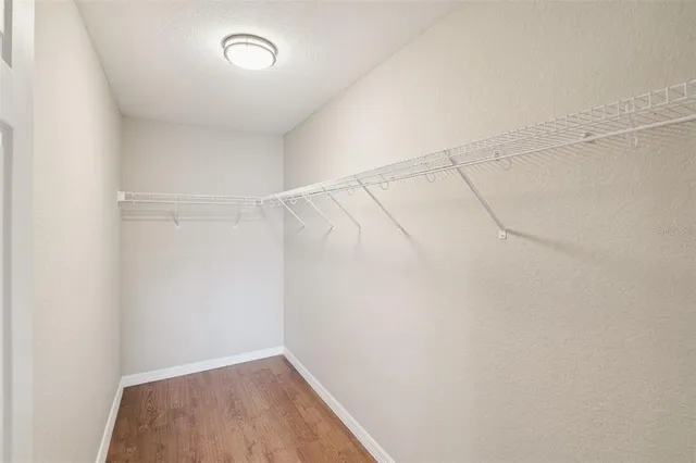 a view of a room with racks on the wall