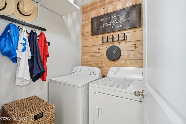a bathroom with a toilet and a shower curtain