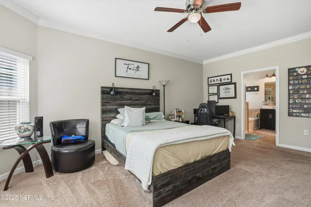 a bedroom with a bed and a couch