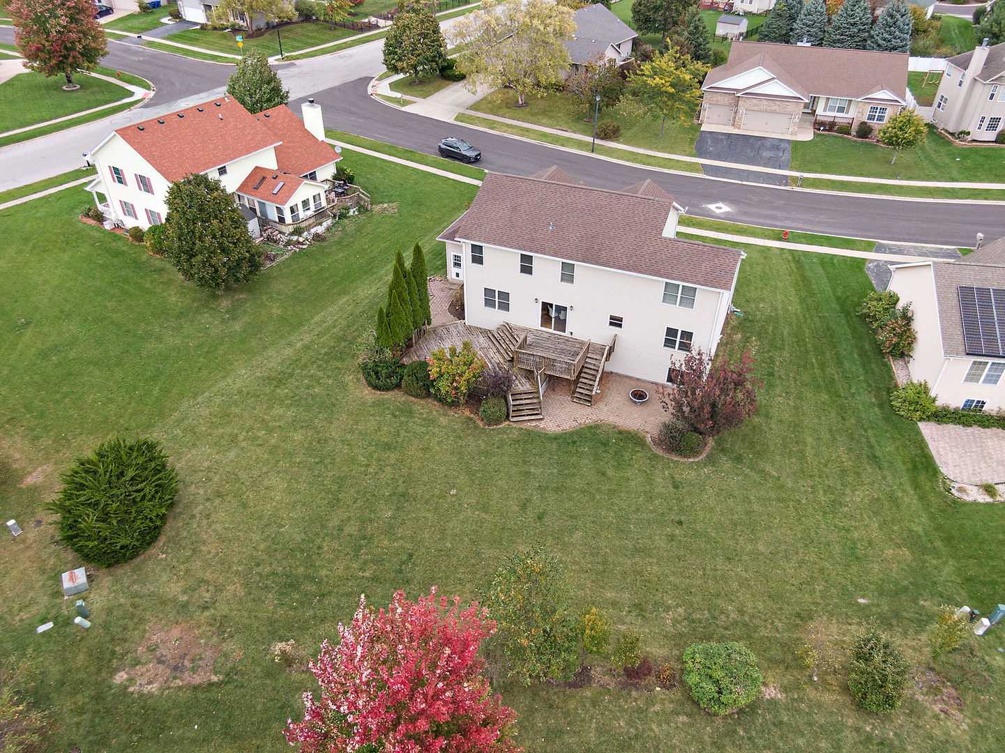 685 Persimmon Street DeKalb, IL 60115 - Photo 35 of 38 an aerial view of a house with a garden