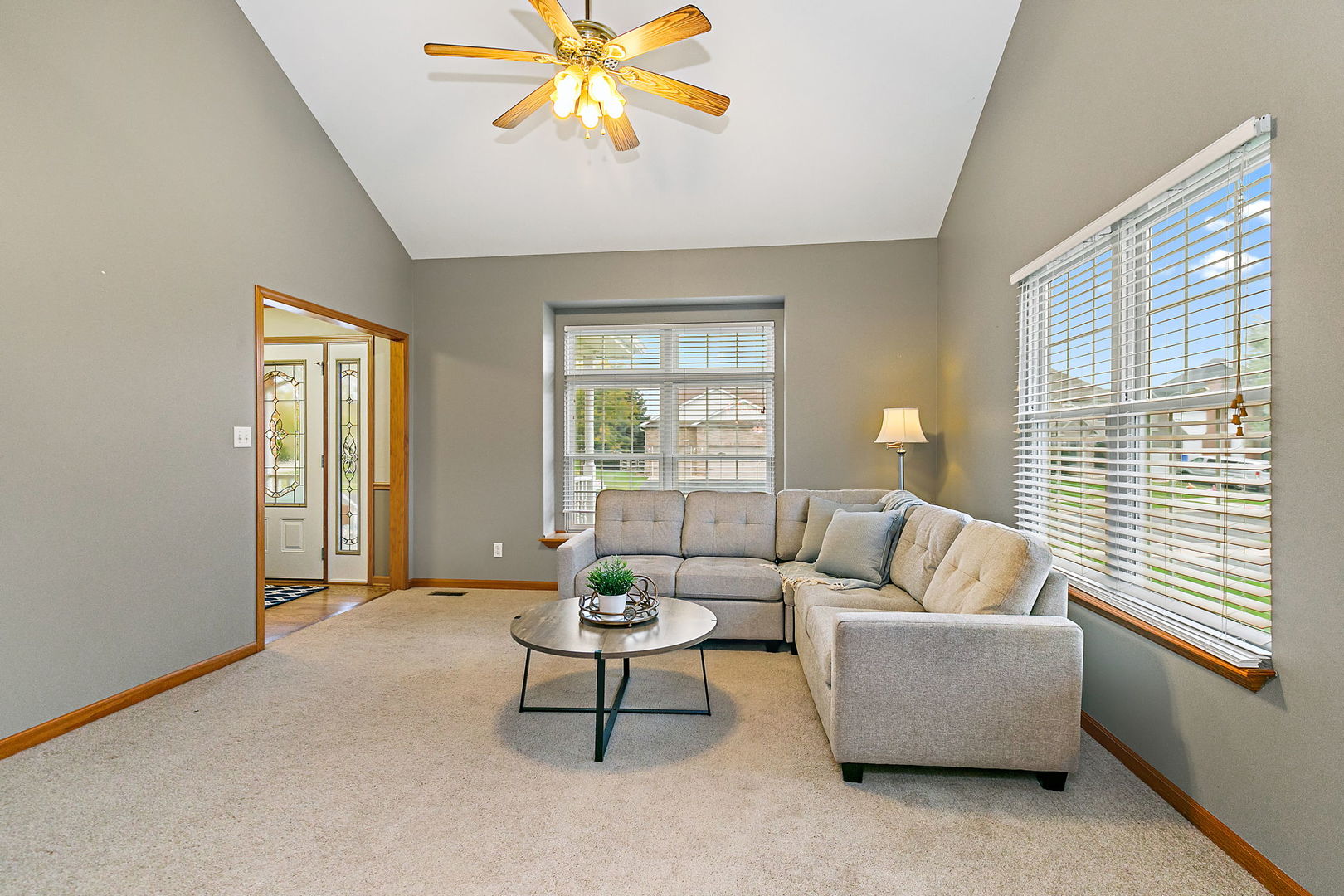685 Persimmon Street DeKalb, IL 60115 - Photo 6 of 38 a living room with furniture and a large window