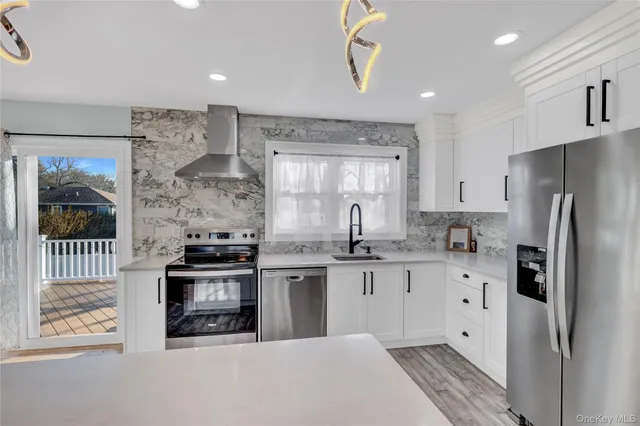 $569,999 | 39 Roosevelt Boulevard, East Patchogue, NY 11772