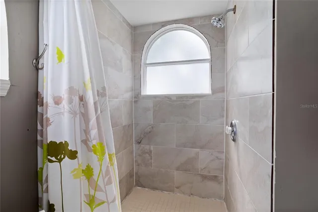 a bathroom with a sink and bathtub