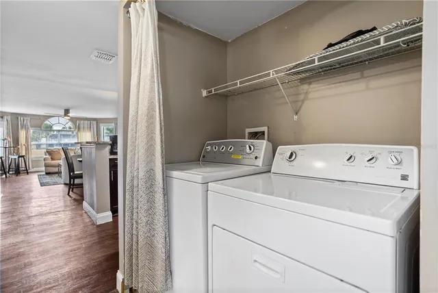 a utility room with dryer and washer