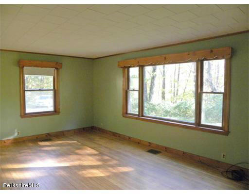 11 Burrington Road Charlemont, MA 01339 - Photo 5 of 11 an empty room with a window