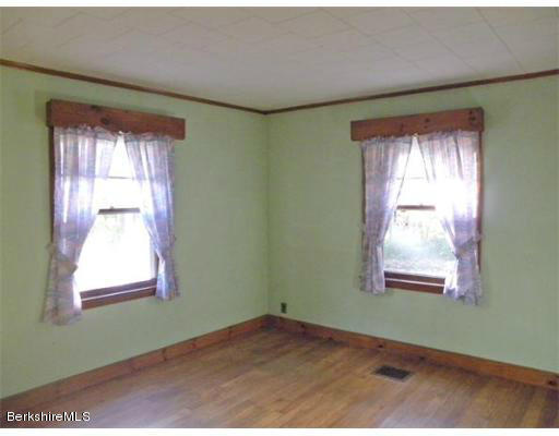 11 Burrington Road Charlemont, MA 01339 - Photo 6 of 11 a view of an empty room with a window