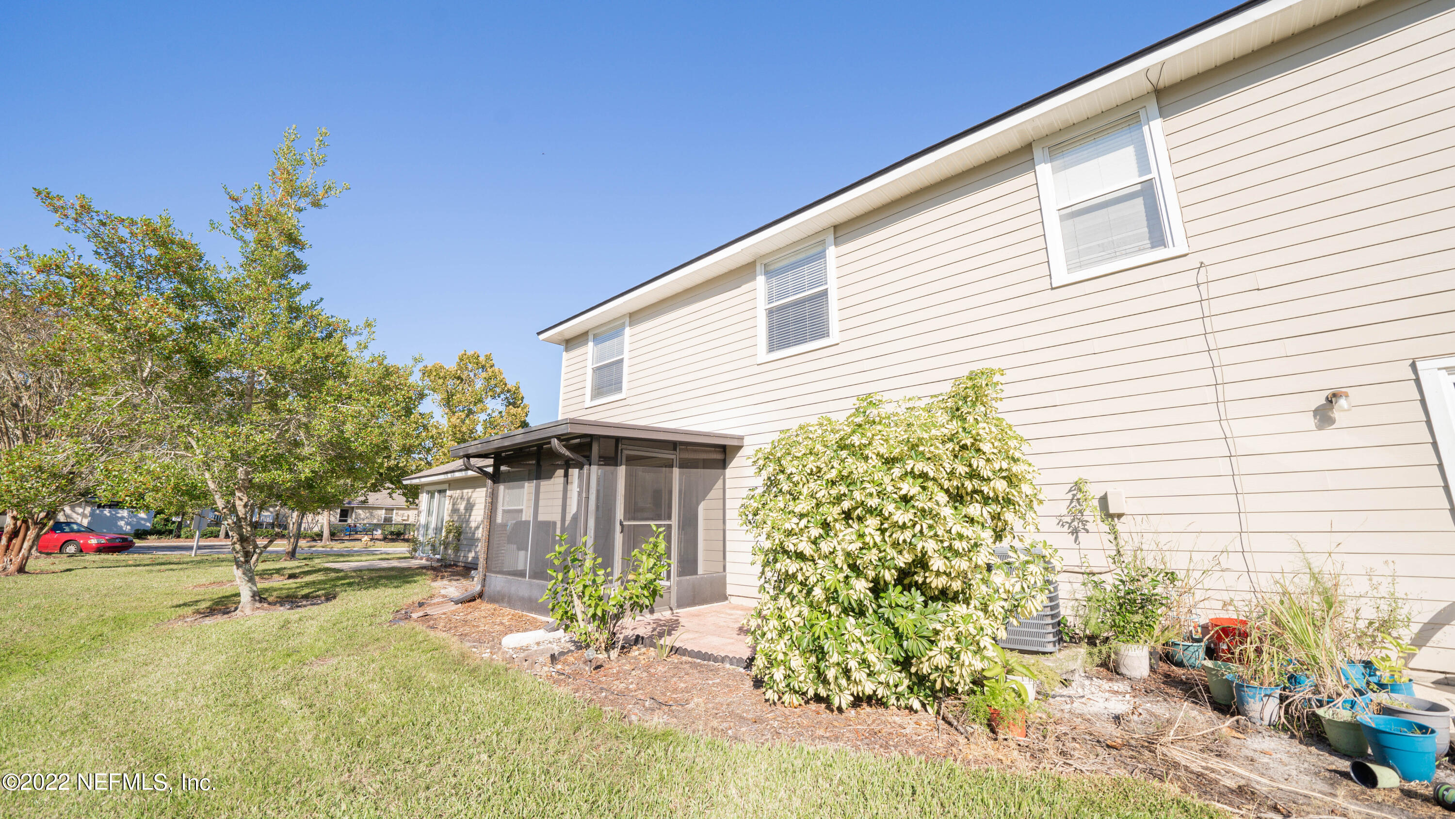 500 South Steel Bridge Road, Unit 3 St. Johns, FL 32259 - Photo 18 of 43 a view of a house with backyard and sitting area
