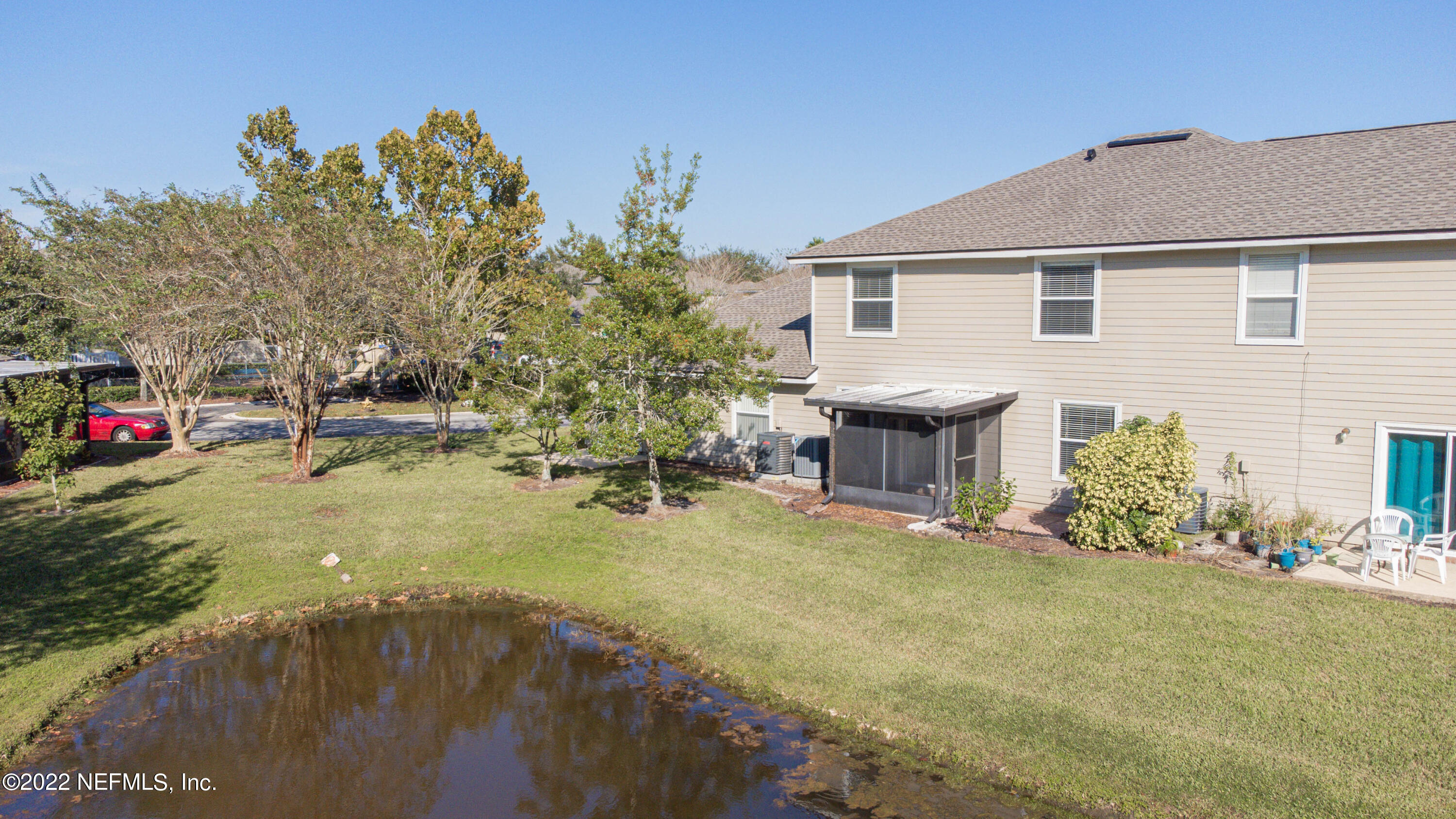 500 South Steel Bridge Road, Unit 3 St. Johns, FL 32259 - Photo 19 of 43 a view of a backyard with sitting area