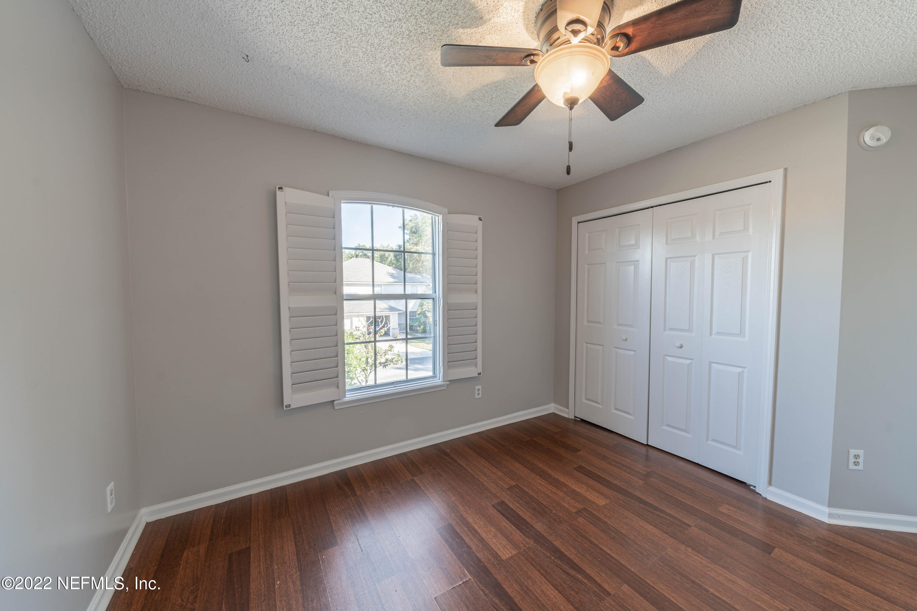 500 South Steel Bridge Road, Unit 3 St. Johns, FL 32259 - Photo 30 of 43 a view of an empty room with window and wooden floor