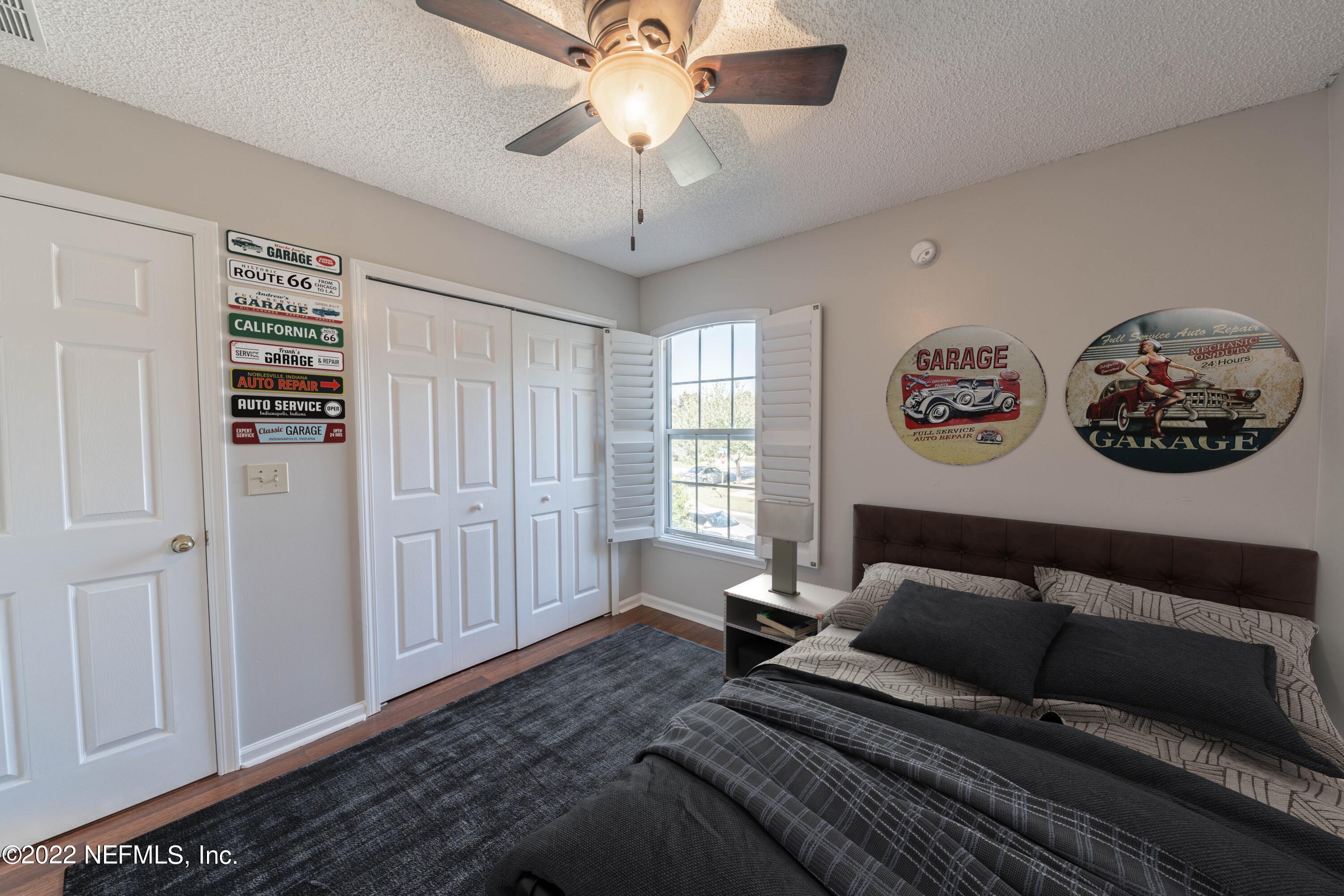 500 South Steel Bridge Road, Unit 3 St. Johns, FL 32259 - Photo 39 of 43 a bedroom with furniture and a window