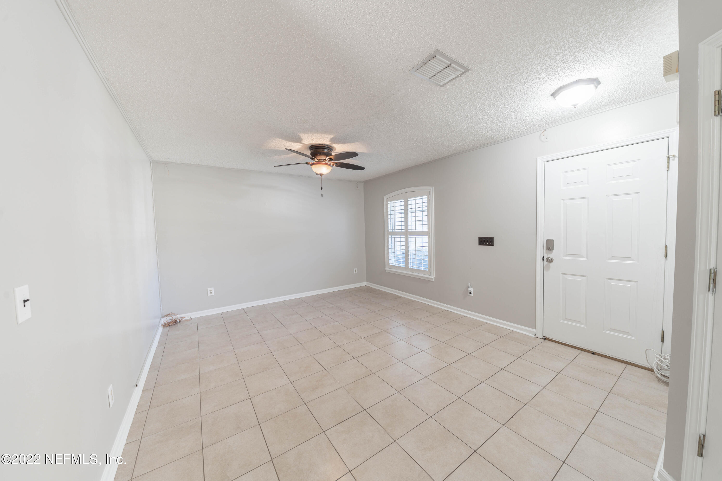500 South Steel Bridge Road, Unit 3 St. Johns, FL 32259 - Photo 5 of 43 a view of an empty room with a window