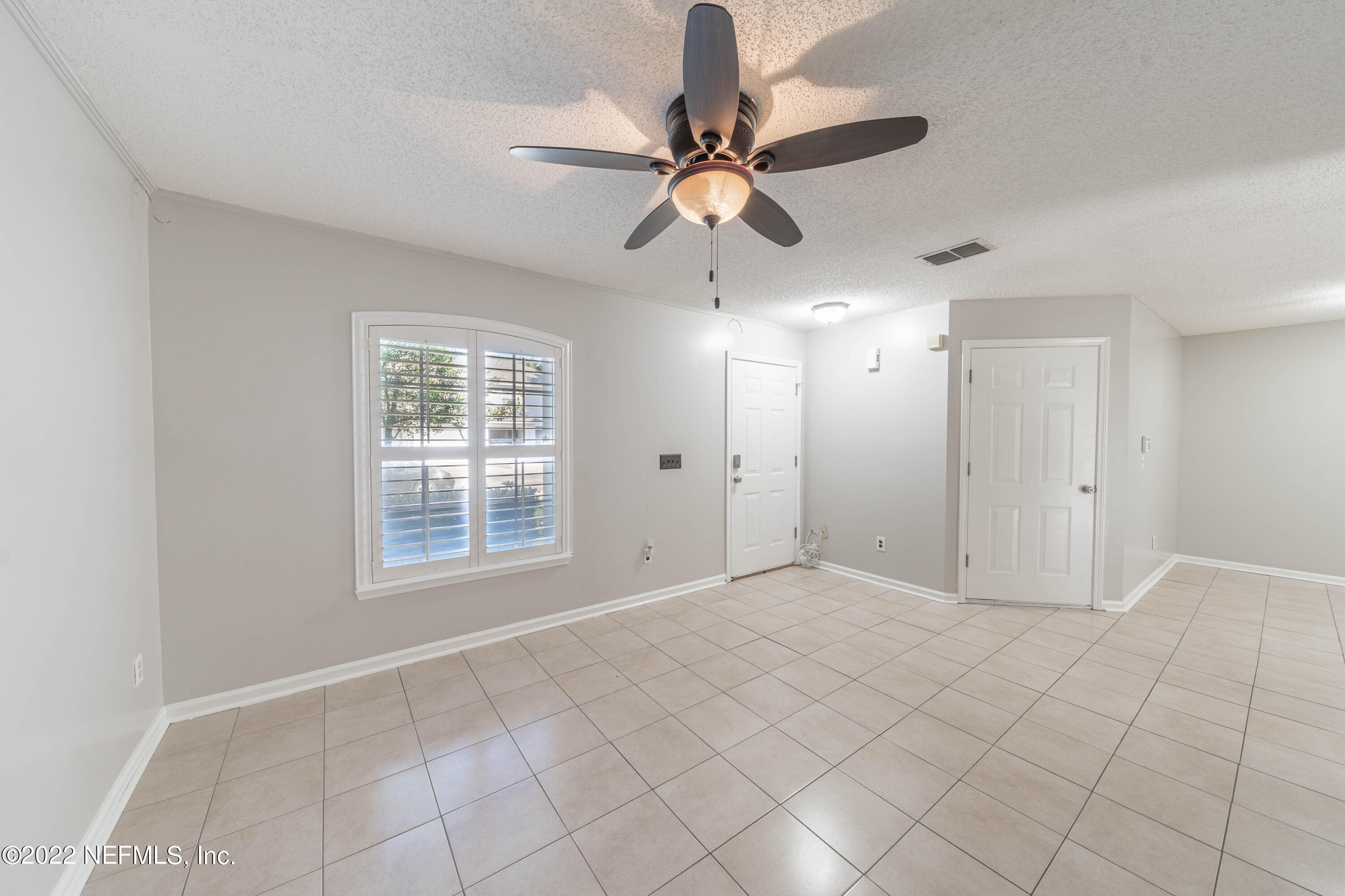 500 South Steel Bridge Road, Unit 3 St. Johns, FL 32259 - Photo 7 of 43 a view of an empty room and a window