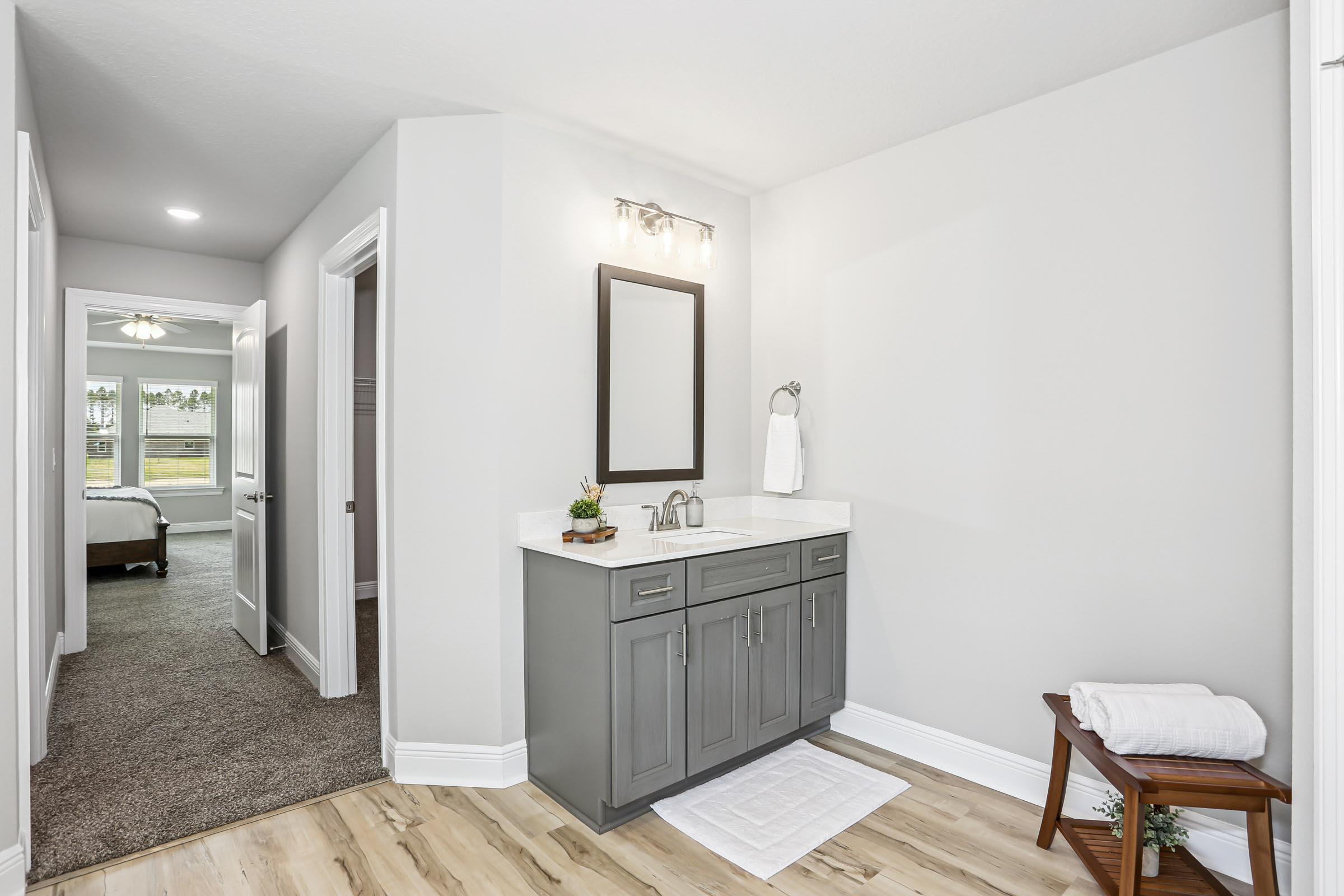 4863 Horace Lunsford Road Milton, FL 32570 - Photo 20 of 36 a bathroom with a sink and a mirror