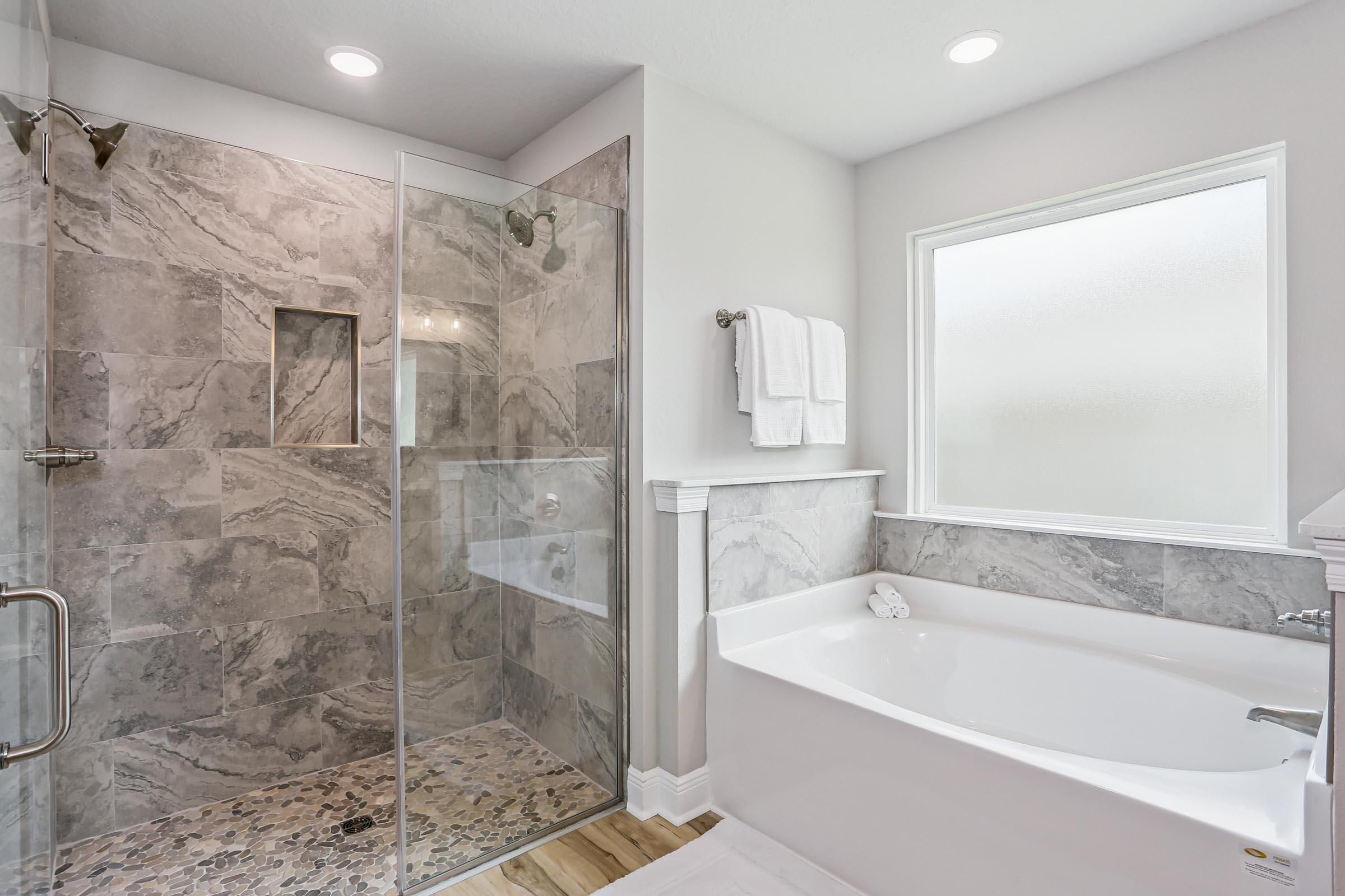 4863 Horace Lunsford Road Milton, FL 32570 - Photo 22 of 36 a bathroom with a bathtub and shower