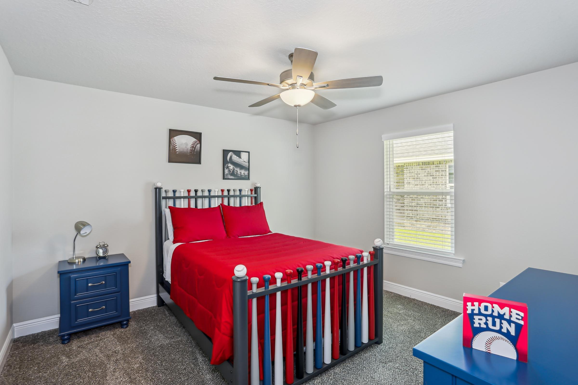 4863 Horace Lunsford Road Milton, FL 32570 - Photo 27 of 36 a bedroom with a bed and a window