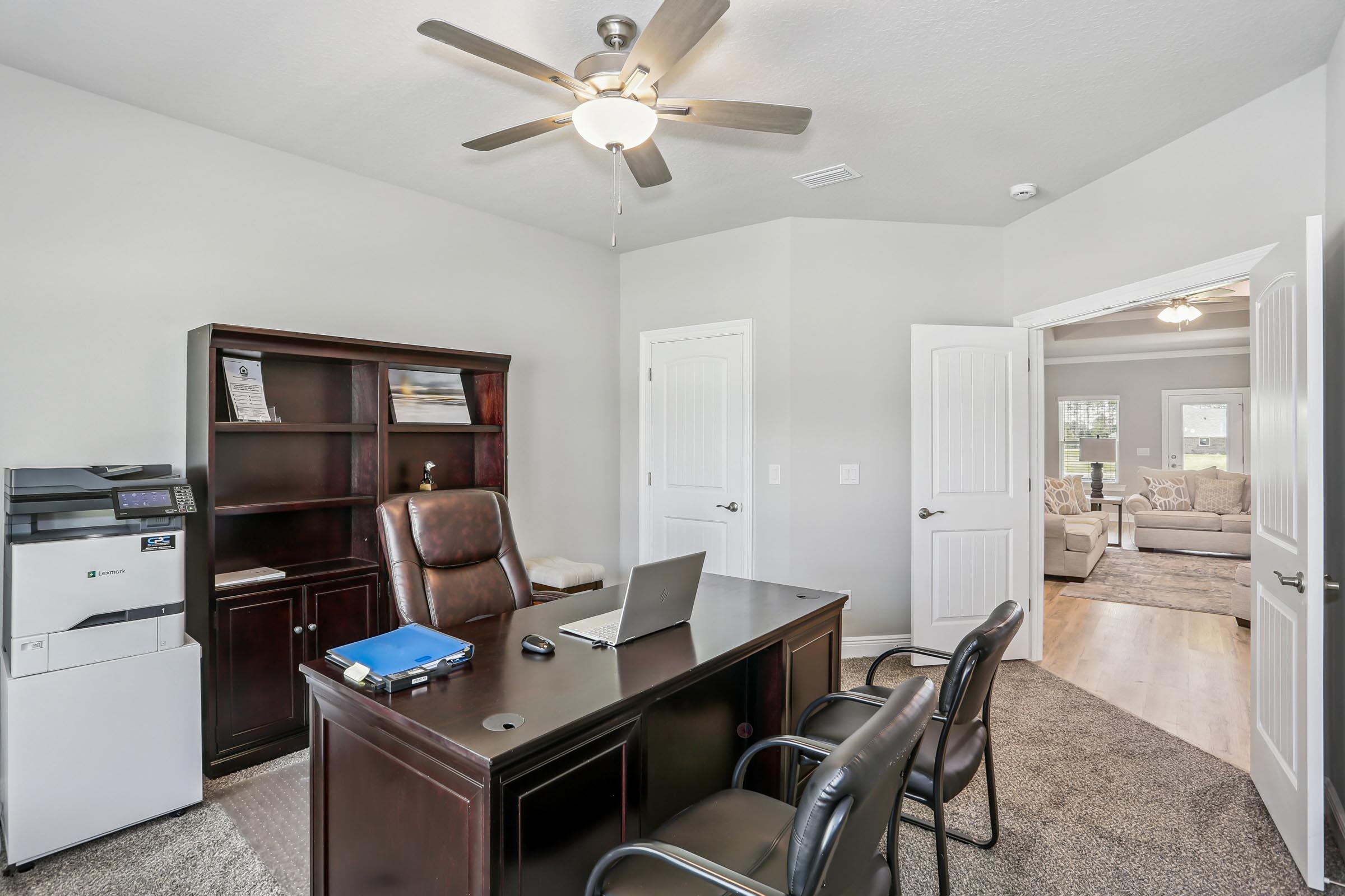 4863 Horace Lunsford Road Milton, FL 32570 - Photo 33 of 36 a workspace with furniture