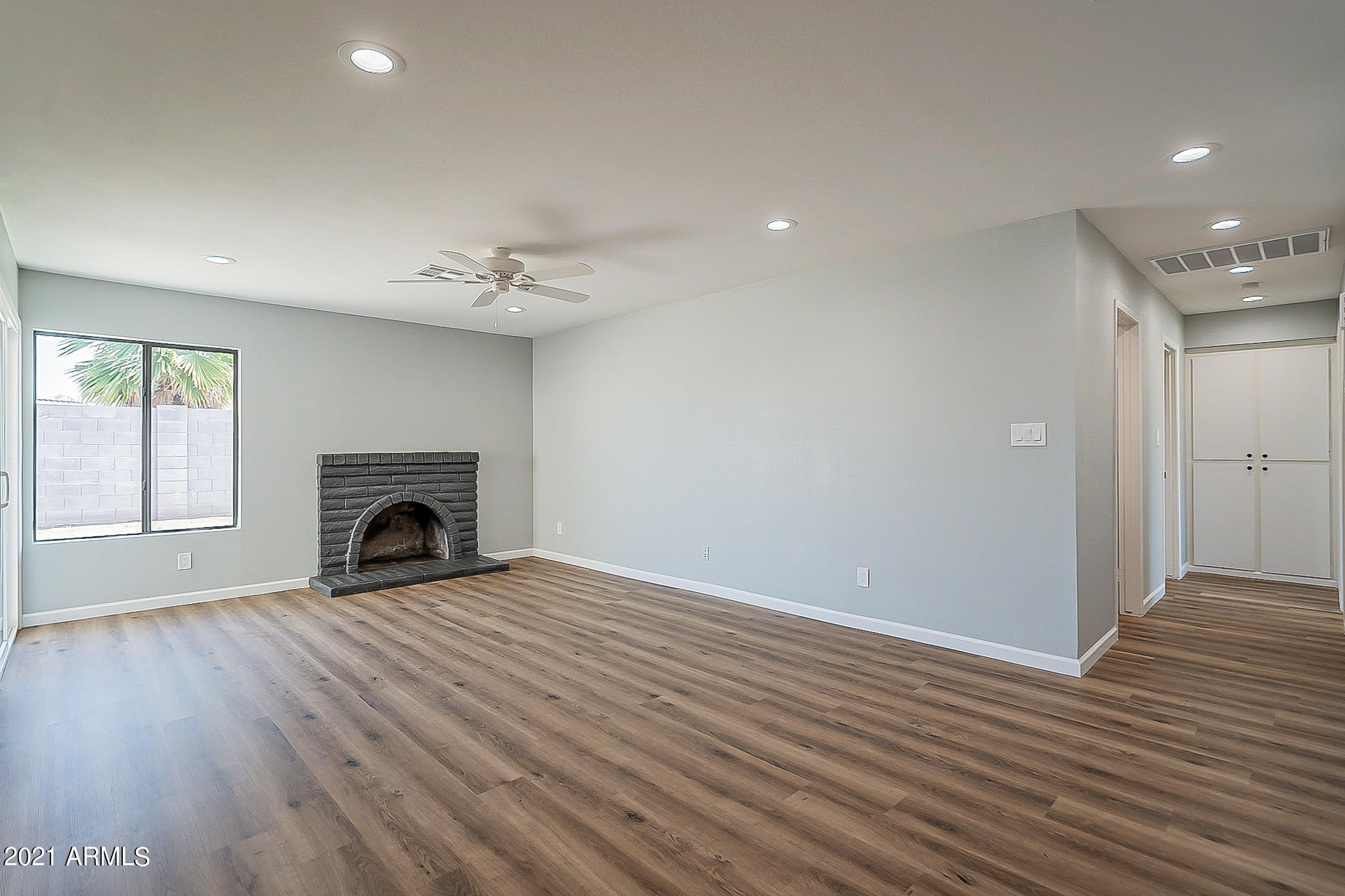 4233 West Hearn Road Phoenix, AZ 85053 - Photo 9 of 39 9-Fireplace in Living Rm