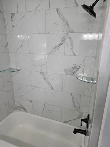 a bathroom with a bathtub