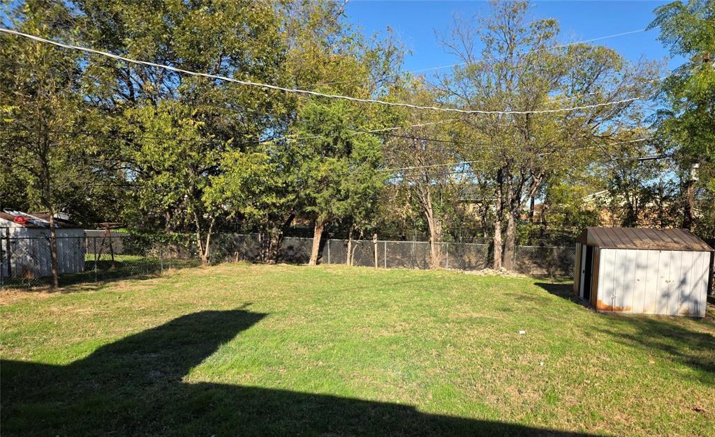 3005 Farrell Lane Fort Worth, TX 76119 - Photo 16 of 16 a view of yard with swimming pool and seating area