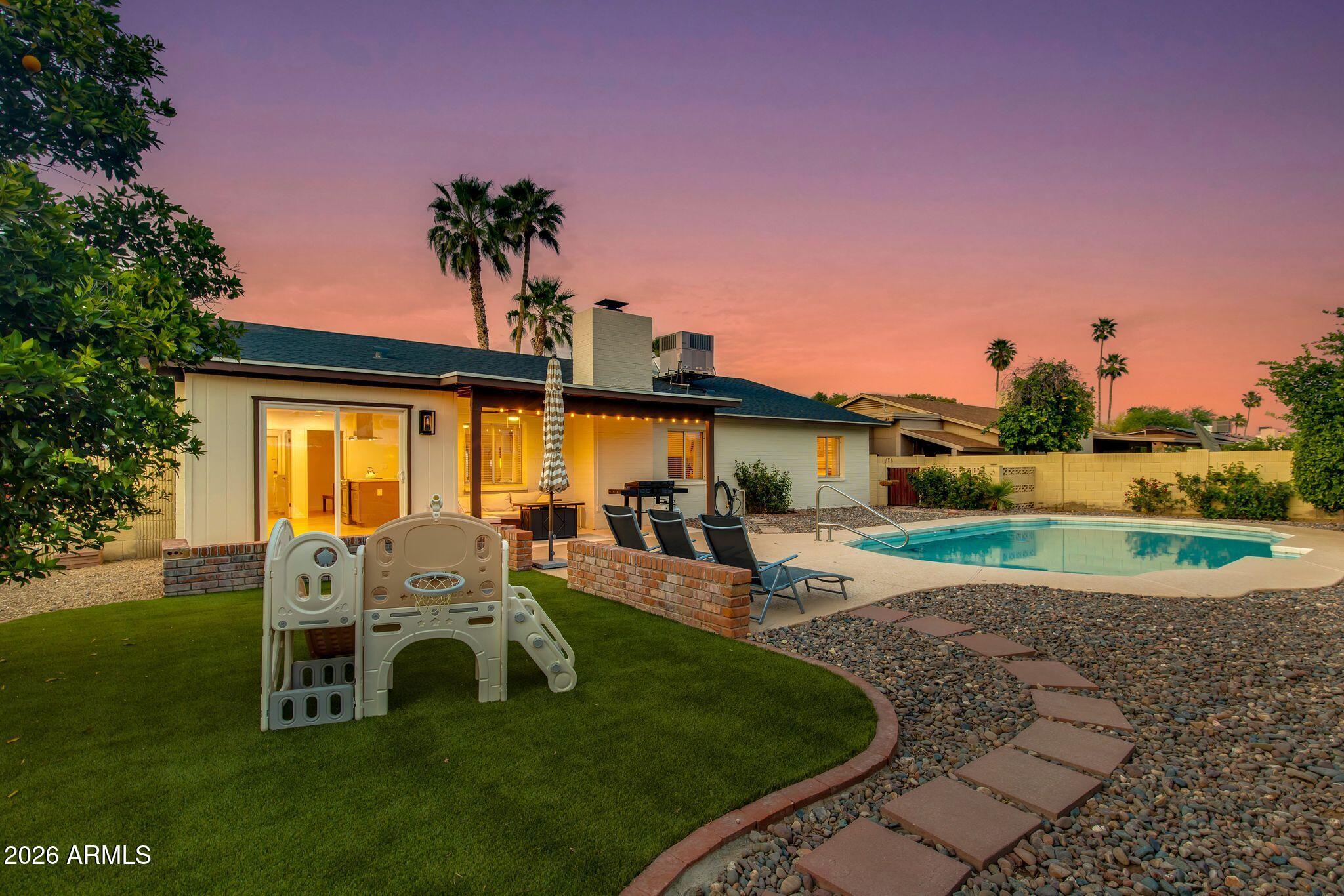 4835 East Presidio Road Phoenix, AZ 85032 - Photo 26 of 30 Backyard with Turf + Pool