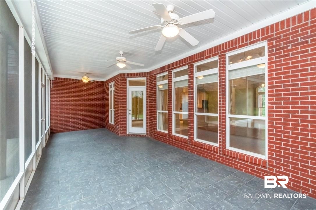 8837 Dawes Lake Road South Mobile, AL 36619 - Photo 34 of 44 Unfurnished sunroom featuring ceiling fan