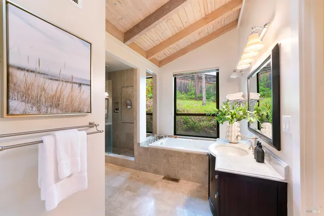 a view of an entryway with wooden floor and a porch