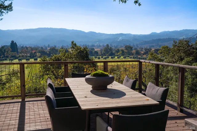a view of a balcony with mountain view