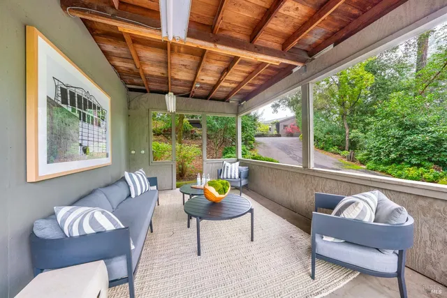 a outdoor living space with furniture and outdoor seating