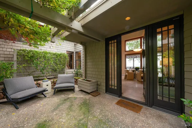 a outdoor living space with furniture and garden view