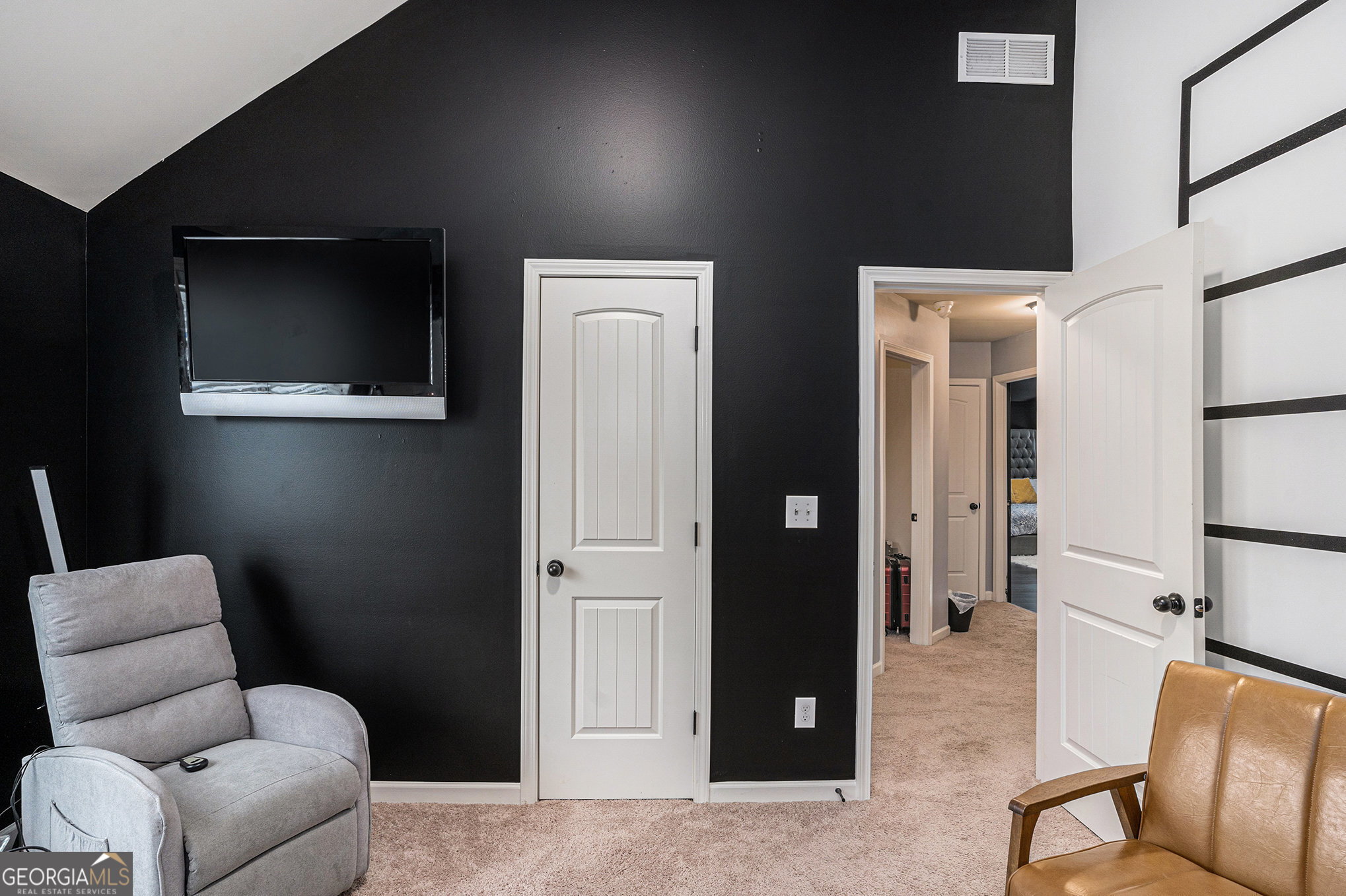 121 Amelia Way Ellenwood, GA 30294 - Photo 25 of 31 a living room with furniture