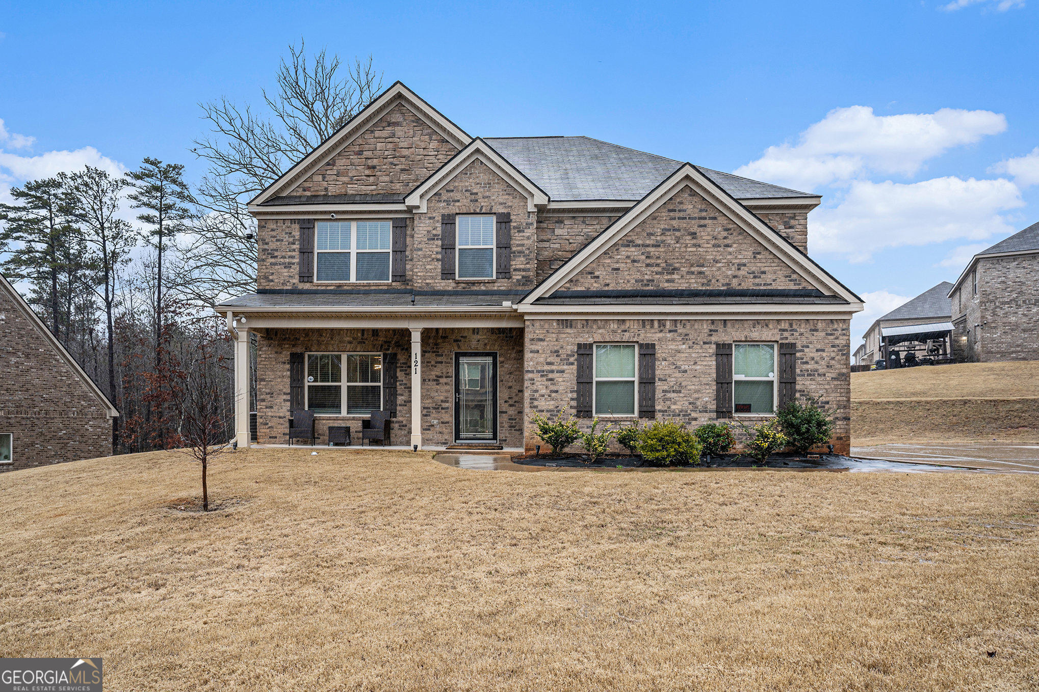 121 Amelia Way Ellenwood, GA 30294 - Photo 3 of 31 a front view of a house with a yard
