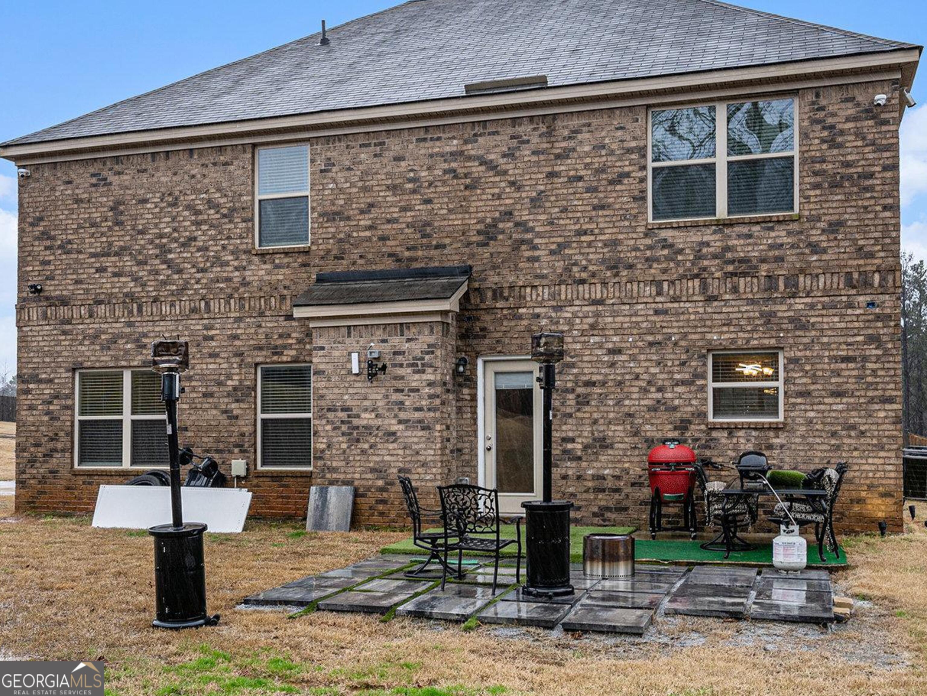 121 Amelia Way Ellenwood, GA 30294 - Photo 31 of 31 a front view of a house with garden