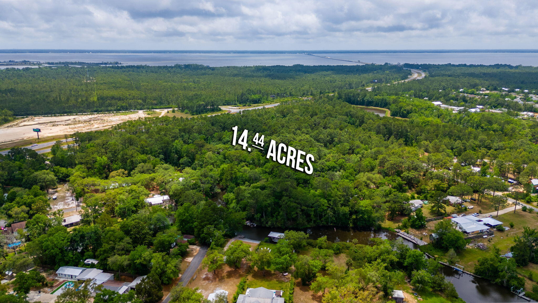19494 Highway 331 Freeport, FL 32439 - Photo 4 of 36 a view of a city with lush green forest