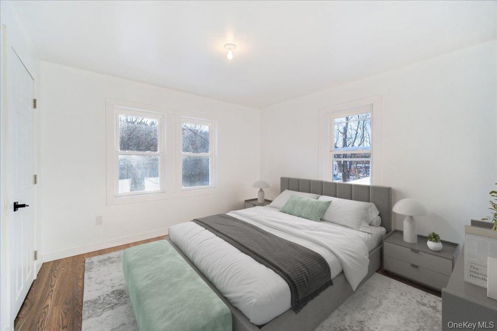 11 Spring Glen Road Mountain Dale, NY 12763 - Photo 20 of 26 a bedroom with a bed and a window