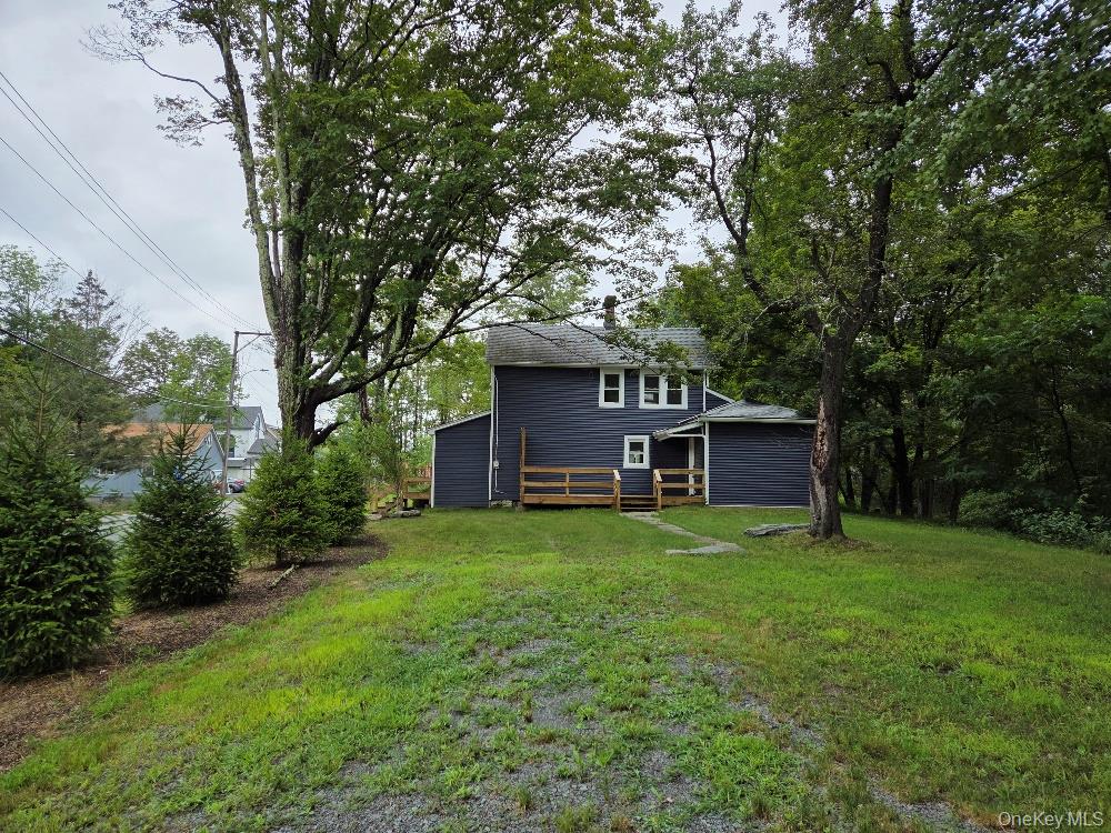 11 Spring Glen Road Mountain Dale, NY 12763 - Photo 2 of 26 a view of a house with a yard