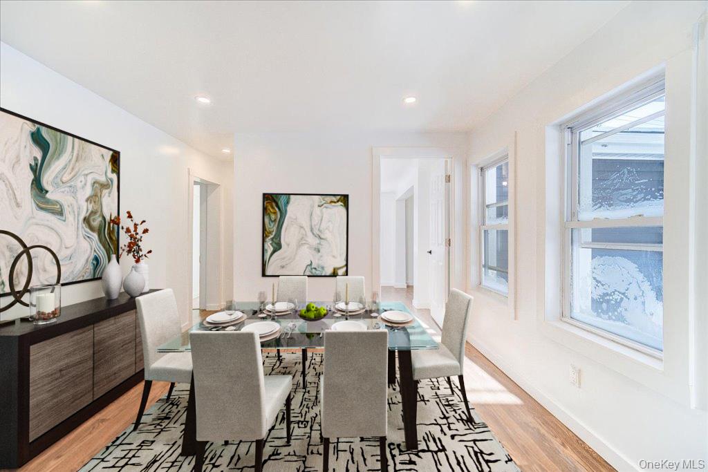 11 Spring Glen Road Mountain Dale, NY 12763 - Photo 9 of 26 a view of a dining room with furniture window and wooden floor