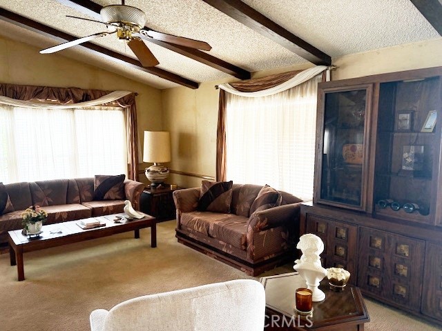 14851 Jeffrey Road, Unit 331 Irvine, CA 92618 - Photo 2 of 12 a living room with furniture and a window