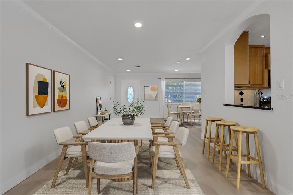 3856 Tarpon Road Venice, FL 34293 - Photo 12 of 53 a view of a dining room with furniture