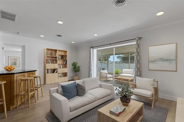 a living room with furniture and a table