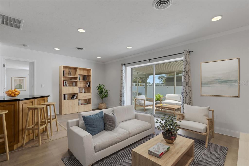 3856 Tarpon Road Venice, FL 34293 - Photo 15 of 53 a living room with furniture and a table