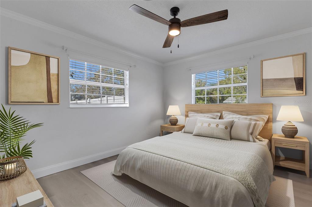 3856 Tarpon Road Venice, FL 34293 - Photo 25 of 53 a bedroom with bed and a window