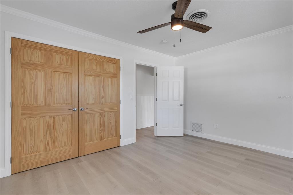 3856 Tarpon Road Venice, FL 34293 - Photo 27 of 53 wooden floor in an empty room