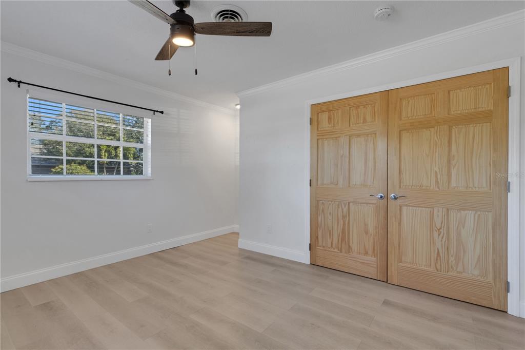 3856 Tarpon Road Venice, FL 34293 - Photo 30 of 53 an empty room with windows and closet