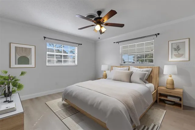 a bedroom with a bed and window