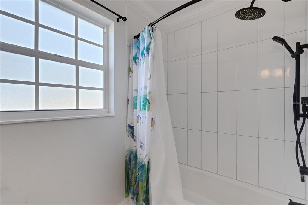 3856 Tarpon Road Venice, FL 34293 - Photo 38 of 53 a bathroom with a shower