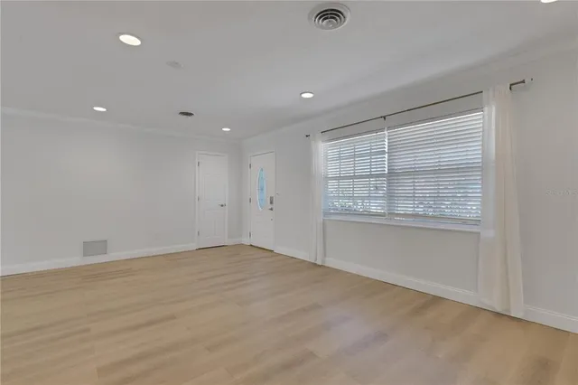 an empty room with windows