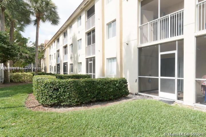 420 South Park Road, Unit 2110 Hollywood, FL 33021 - Photo 2 of 15 a view of a building with a garden